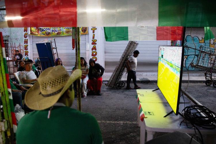 Priced out of World Cup games, Mexican fans take celebrations into their own hands