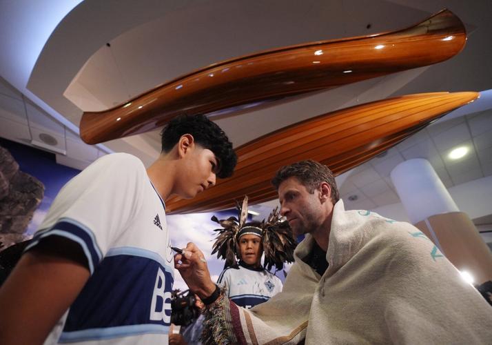 Newly minted Whitecaps star Thomas Muller arrives in Vancouver