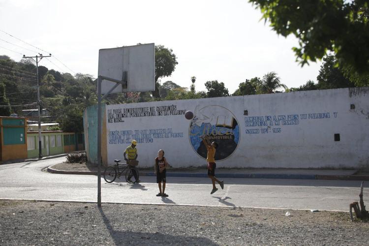 Tigers, swimming pools, a nightclub: The gang drawing Trump's ire started in a Venezuelan prison