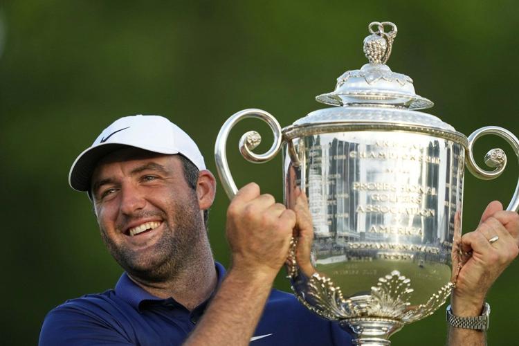 AP PHOTOS: Scheffler pulls away to win PGA Championship for third major title