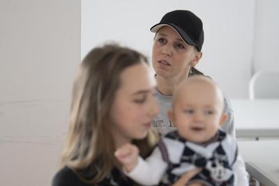'We couldn't let go': War tears young Ukrainian family apart