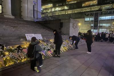 B.C. community holds vigil to mourn deaths, losses in deadly Hong Kong fire