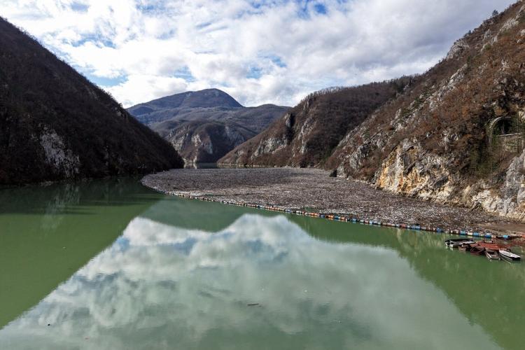 As winter comes, so does garbage. A river in Bosnia chokes in tons of waste year after year