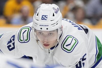 Canucks send two players, 2027 second-round pick to Blackhawks for 2027 fourth