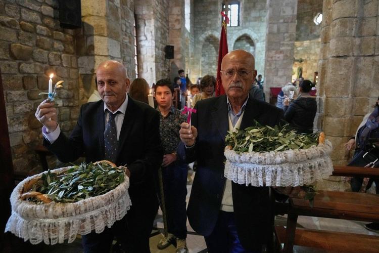 Photos show Lebanon's Catholics marking Palm Sunday as the shadow of war weighs heavily