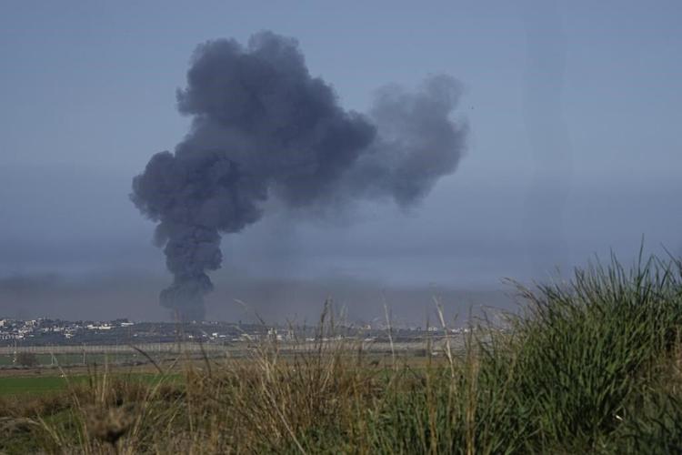 Palestinians stream into a southern Gaza town as Israel expands its offensive in the center