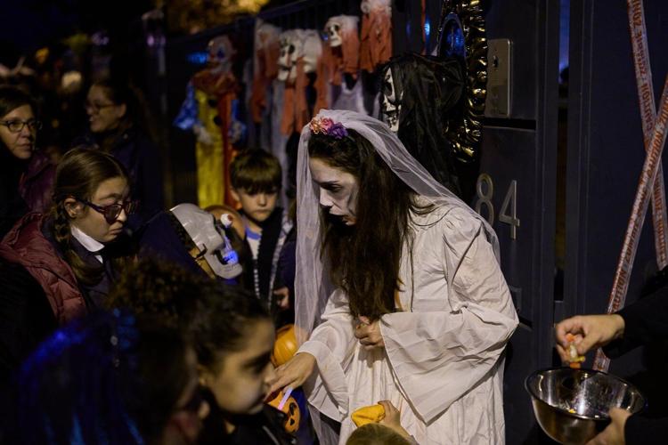 Halloween and a declining Christian tradition coexist on All Saints' Day in Spain