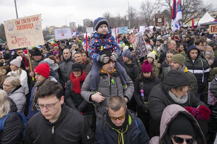 Serbia's striking students and populist president hold parallel rallies as tensions spike
