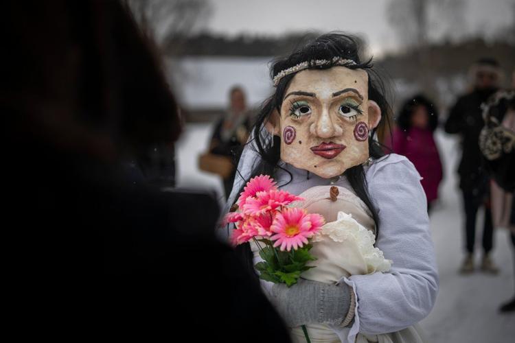 Photos show masked revelers celebrating Shrovetide in Lithuania