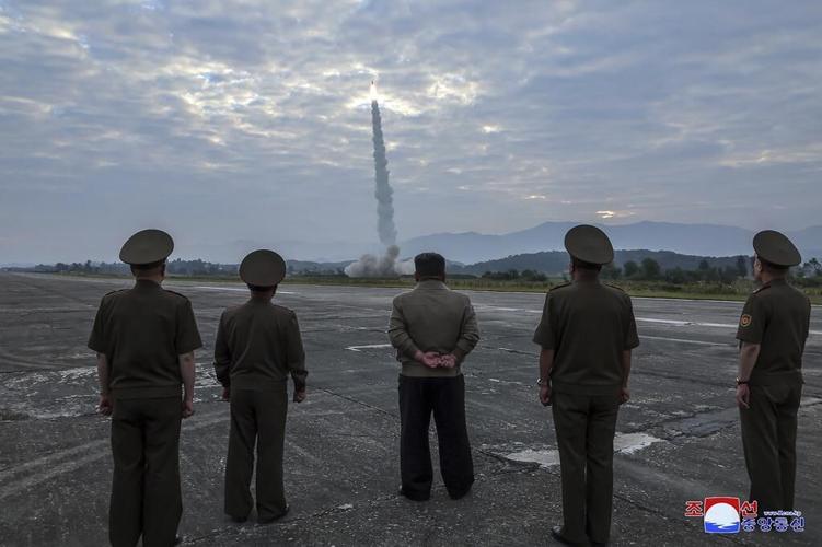 Kim calls for bolstering nuclear and conventional weapons after testing 2 types of missiles