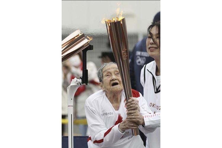 Japan's oldest person is a 114-year-old retired doctor who carried an Olympic torch in 2021