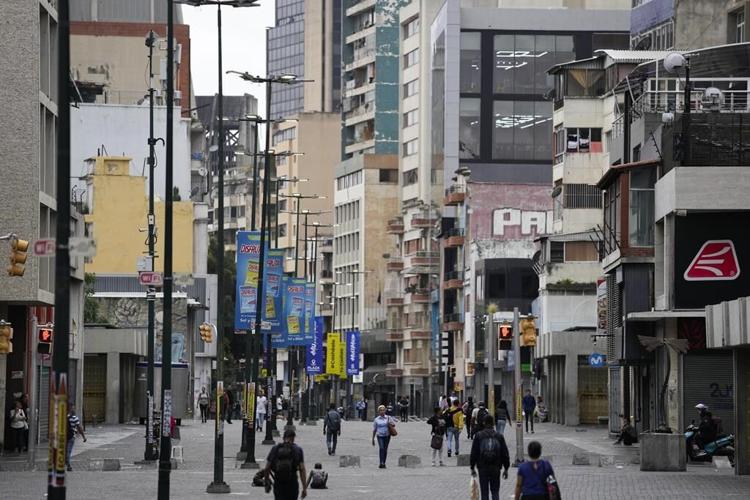 Normally bustling Venezuelan capital is usually quiet after vote in which both sides claimed victory