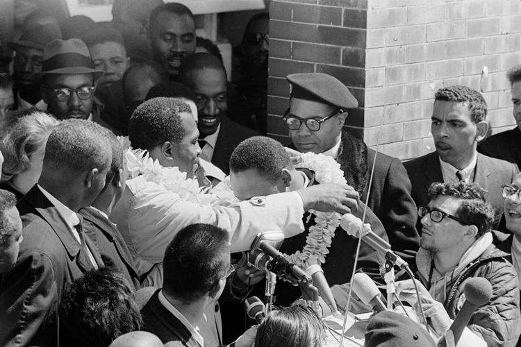 Hawaii displays historic photos of Martin Luther King Jr. wearing flower lei during Selma march