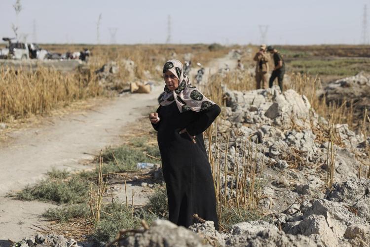 At a mass grave on the outskirts of Damascus, some families learn the fate of missing loved ones