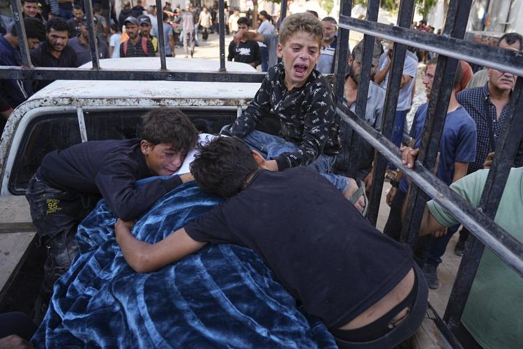 The Latest: Iran's supreme leader rejects call to surrender as Israel strikes Tehran