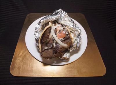 Bids climb as Alberta government auctions off 'excellent, dusty' donair suit