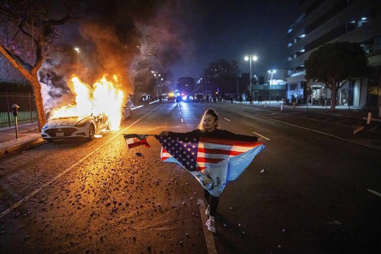 AP PHOTOS: Mexican flags at LA protests spark debate over symbolism