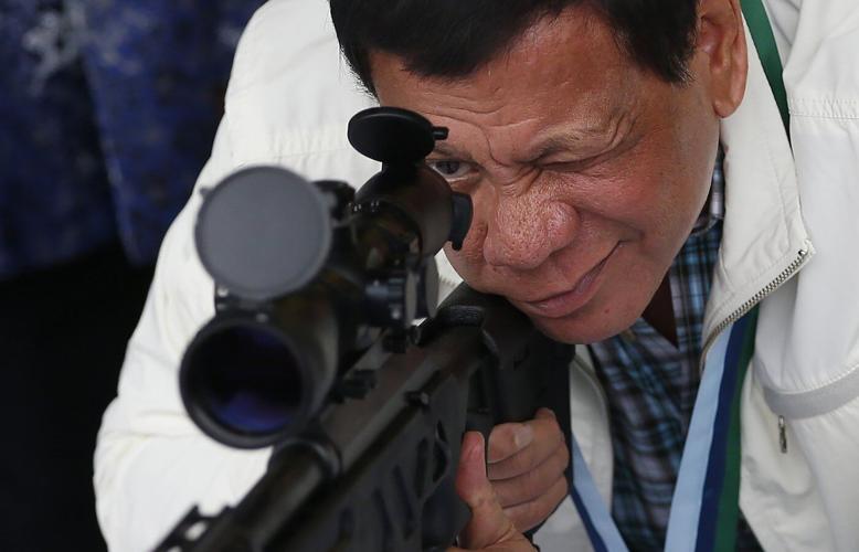 Duterte refused fingerprinting and threatened lawsuits during chaotic arrest, Philippine police say