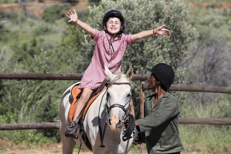 A horse therapy program in Namibia brings joy to children with learning disabilities