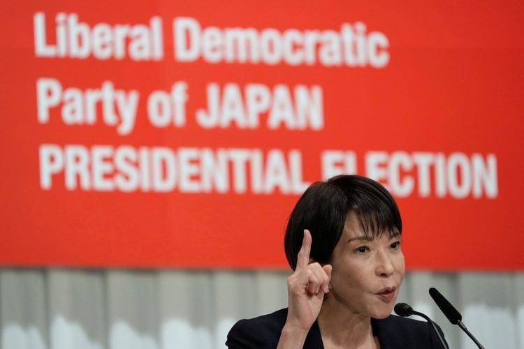 Japan elects its first female prime minister, in photos