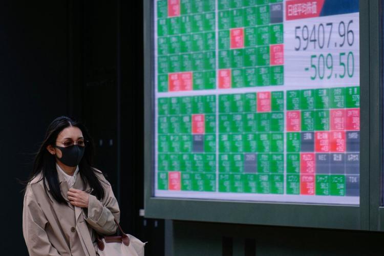 Asian shares gain with most markets closed for May Day, while oil holds steady at $111 a barrel