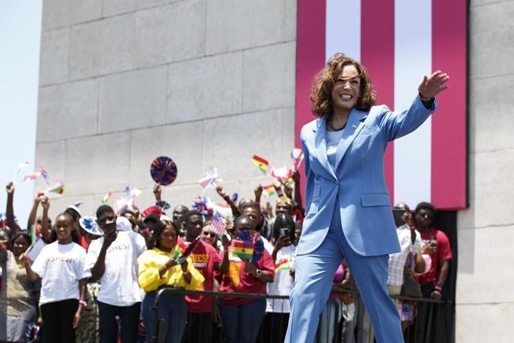 Harris, in Africa, confronts painful past, envisions future
