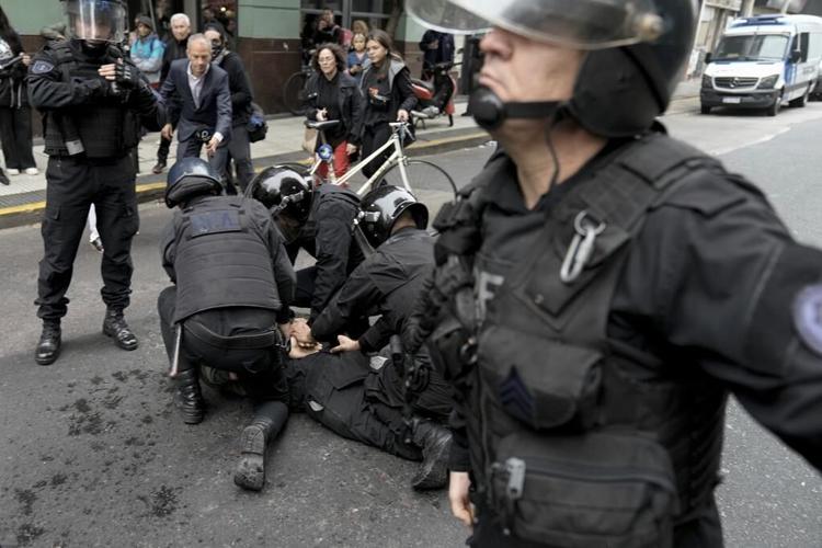 Argentine riot police disperse protesters with water cannons ahead of key Senate vote
