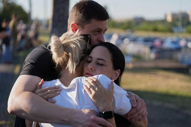 Russian drones kill 14 people at a shopping mall in a central Ukrainian city, officials say