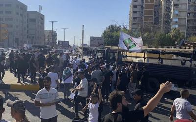 Protesters briefly storm the Swedish Embassy in Baghdad in protest over Quran burning