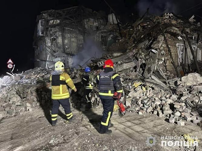 Russian missile strikes in eastern Ukraine tear through buildings and bury families in rubble