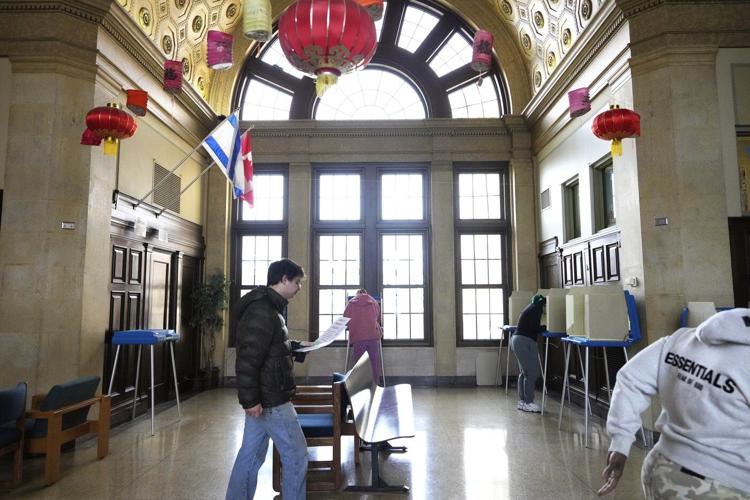 Wisconsin voters to choose top education official and consider voter ID amendment