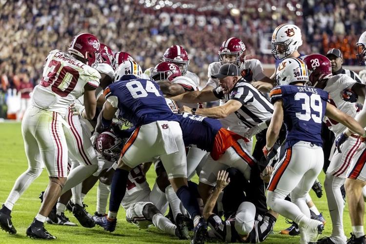 Paying college athletes appears closer than ever. How could it work and what stands in the way?