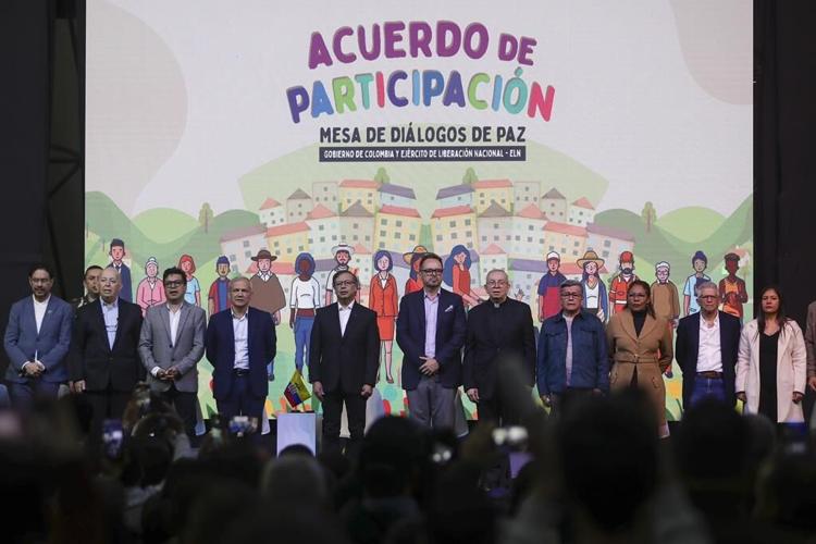 Colombia begins a six-month cease-fire with its last remaining rebel group in hopes of forging peace