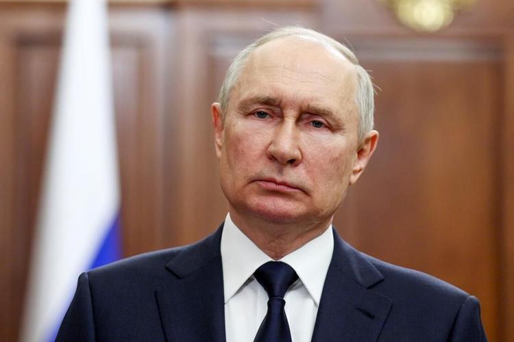 Putin visits a shipyard to oversee the commissioning of new Russian nuclear submarines