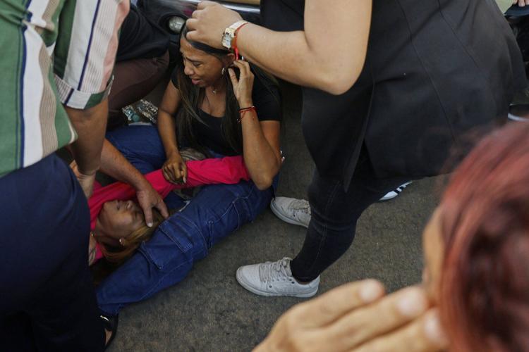 The roof collapses at a Dominican Republic nightclub, killing at least 79 people