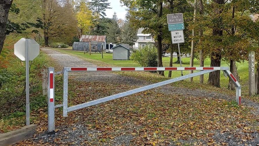 Police search for killer of retired college dean who was shot on trail near university campus