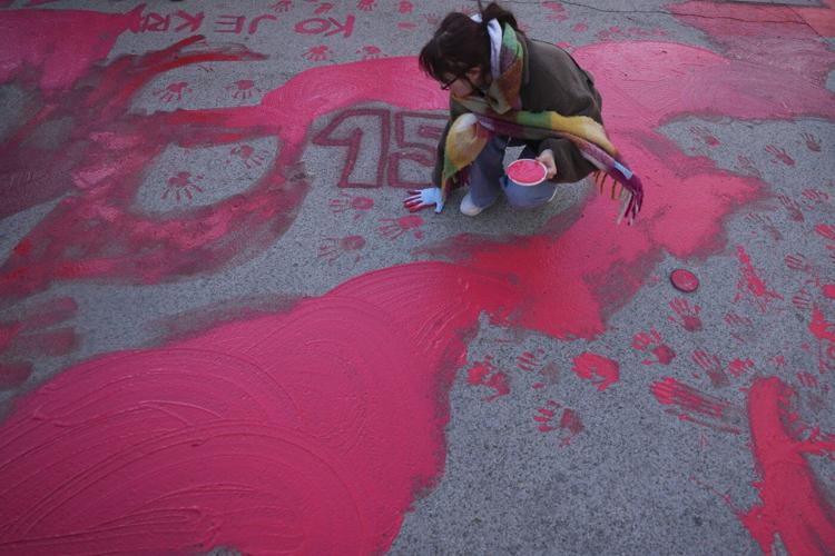 Thousands march in Serbia to mark 1 month since a roof collapse killed 15 people