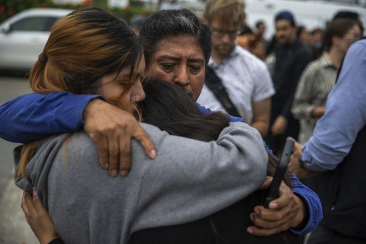Trump administration's use of troops to help with immigration raids faces test in court