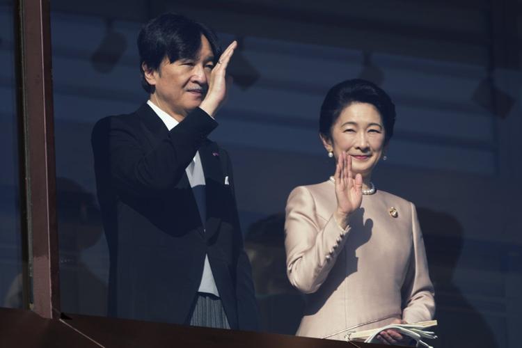 Japan's emperor and his family greet New Year well-wishers