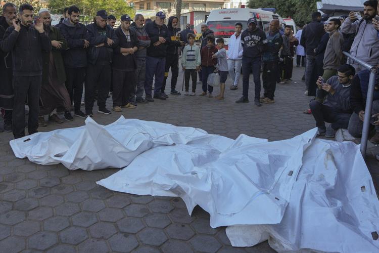 A rocket from Yemen strikes Tel Aviv, injuring 16, and Palestinians mourn a dozen children in Gaza