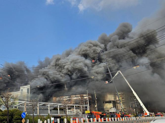 Officials say 14 were killed in fire at South Korean auto parts plant