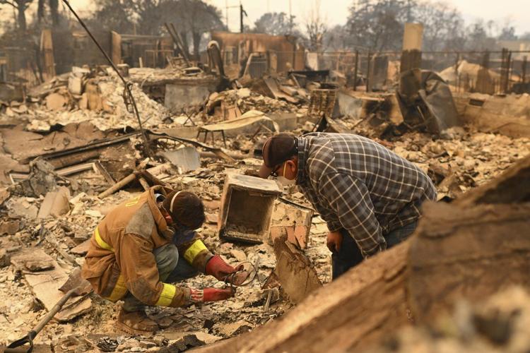 Firefighters make progress slowing wildfires while Los Angeles grapples with scope of devastation
