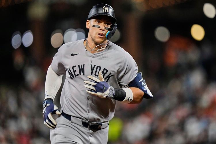 Ohtani is unanimous MVP for 4th time in winning NL honor as Judge edges Raleigh for 3rd AL accolade