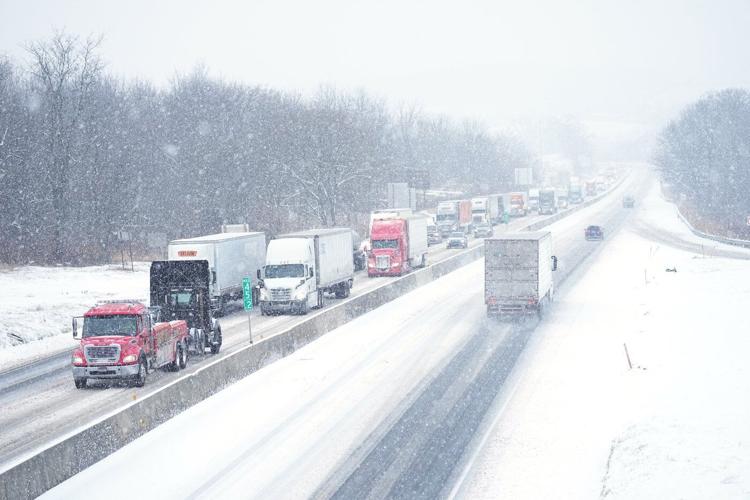 Winter's first big snowstorm hits the Northeast as schools close and traffic slows