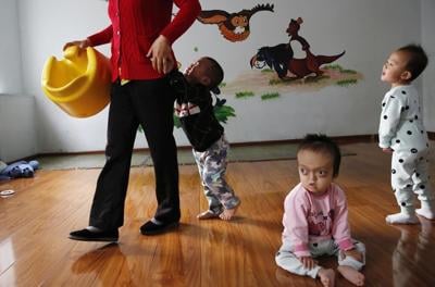 China's halt of foreign adoptions leaves questions about pending cases