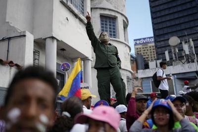 Venezuelans still miss Chavez, want Maduro to do 'better'