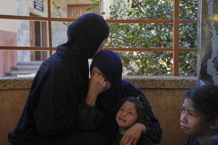 An Israeli strike on Gaza kills 14 Palestinians, mostly women and children, hospitals say