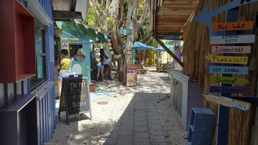 Rain Barrel Village gives visitors a taste of old Florida and a photo op with a giant lobster