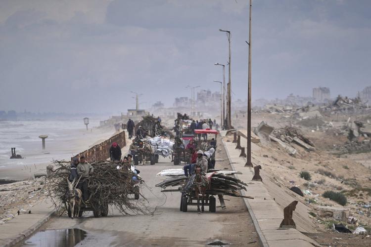 Middle East latest: Israeli defense minister says military is expanding its operation in Gaza