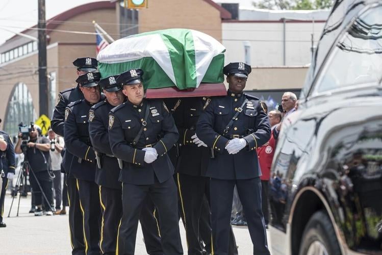 Off-duty NYPD officer who was among 4 killed when drunk driver crashed into nail salon laid to rest